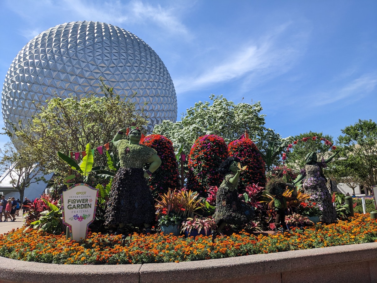 EPCOT International Flower & Garden Festival 2023: Flowers, Butterflies & Food! - Encanto Topiaries at Entrance with Mirabel, Antonio, Isabela, and Luisa