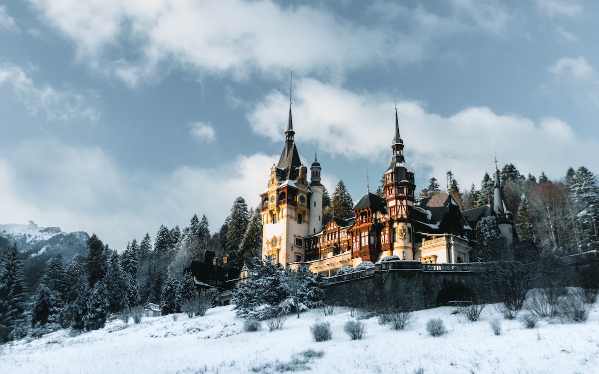 Exploring Transylvania's Iconic Castles, Quaint Villages & Heritage Festivals - Frayed Passport - Peles Castle