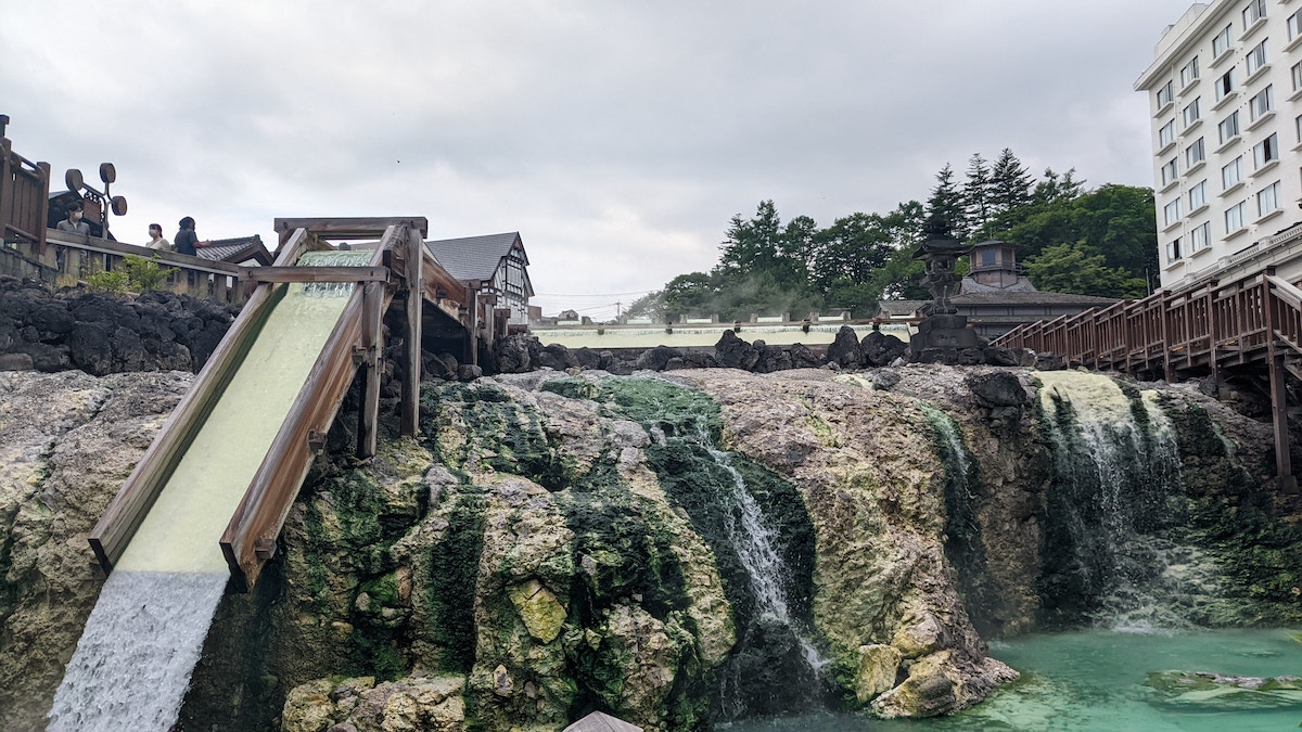 12 Must-Visit Hot Springs for a Rejuvenating Retreat: Iceland, Italy, Japan & Beyond - Kusatsu - Frayed Passport