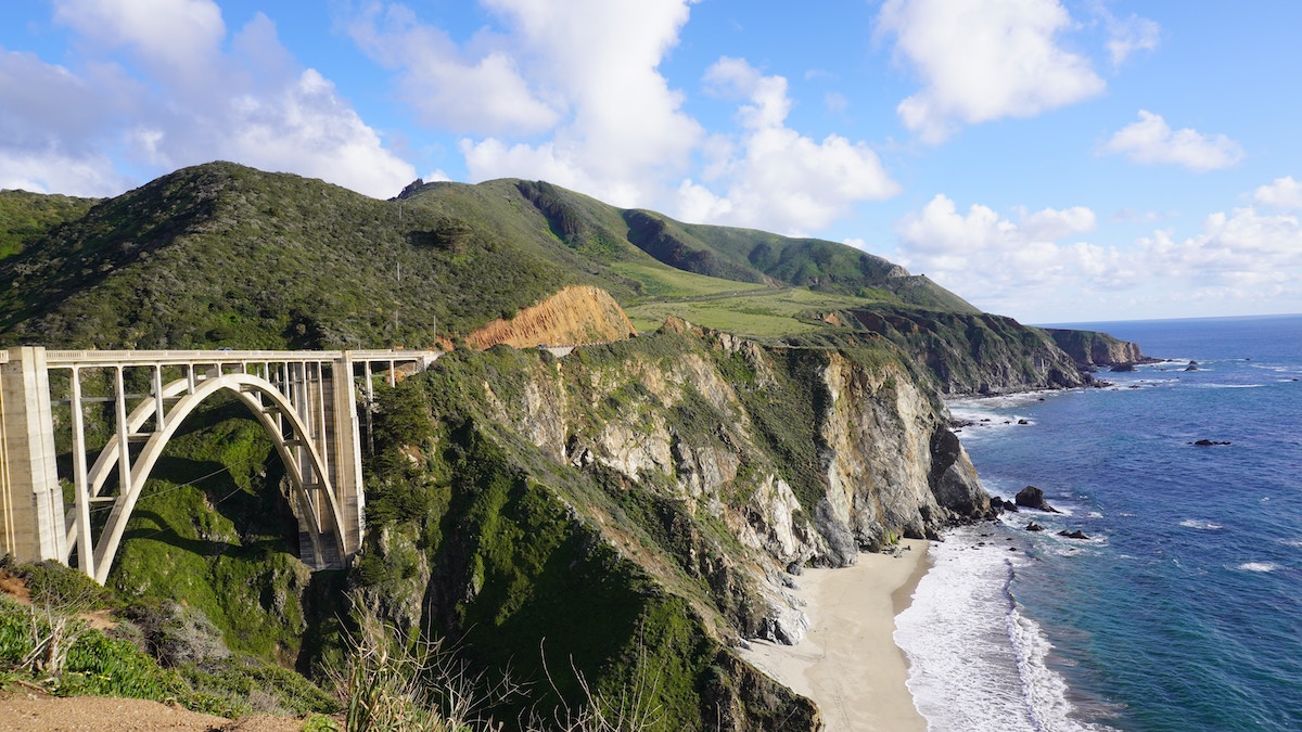 13 Best Scenic Coastal Drives Around the World: Pacific Coast Highway, Great Ocean Road & Beyond - Bixby Creek Bridge on the PCH California - Frayed Passport