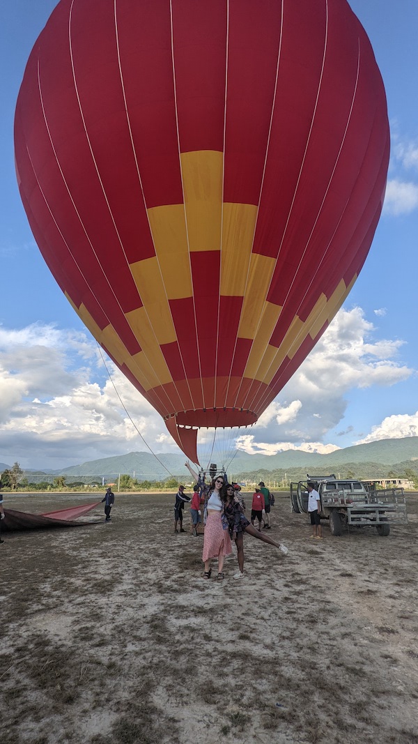 I Took the Cheapest Hot Air Balloon Ride in the World - Blowing up the balloon for a sunset ride - Frayed Passport
