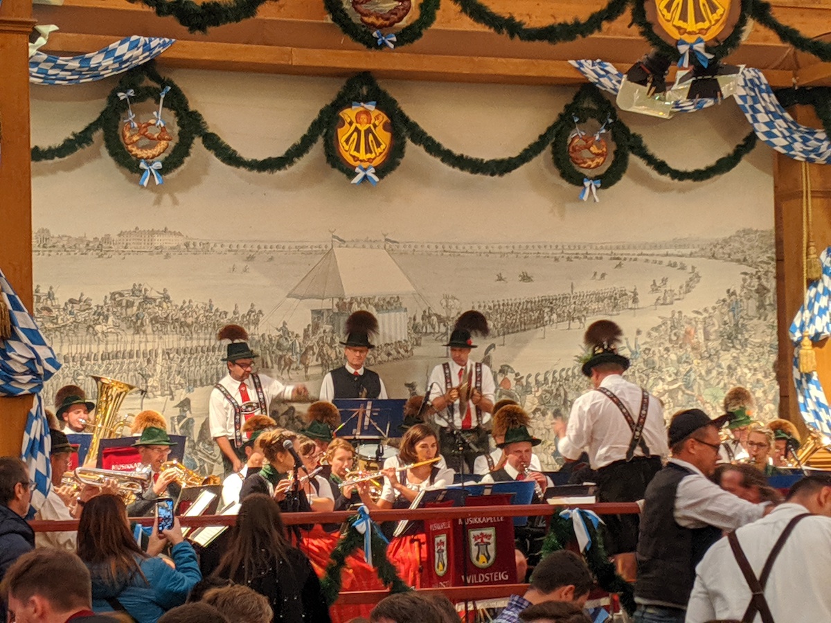 Introduction to Oktoberfest: History & What to Expect at Oktoberfest Munich 2023 - Band playing traditional music - Frayed Passport