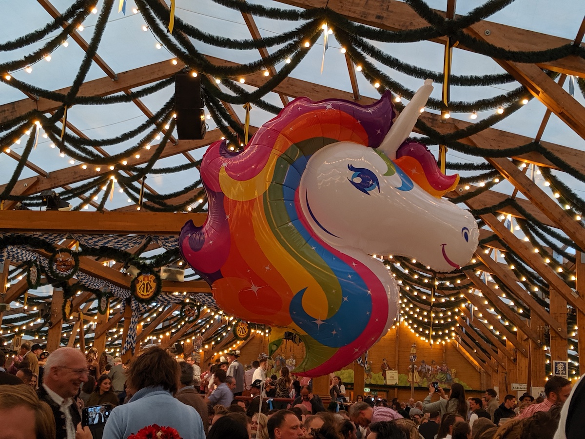 Introduction to Oktoberfest: History & What to Expect at Oktoberfest Munich 2023 - Lisa Frank Unicorn - Frayed Passport