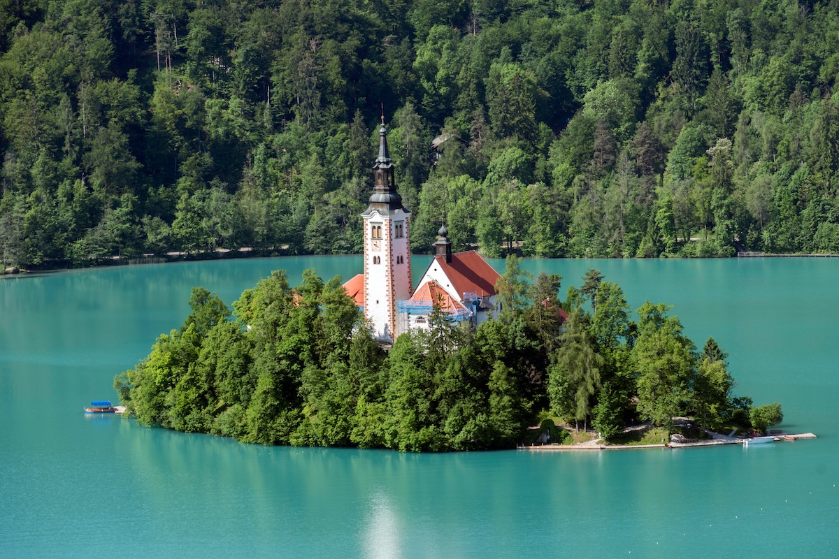 Last-Minute Summer Travel: 15 Less-Visited Destinations to Say Goodbye to the Heat - Frayed Passport - Lake Bled, Slovenia
