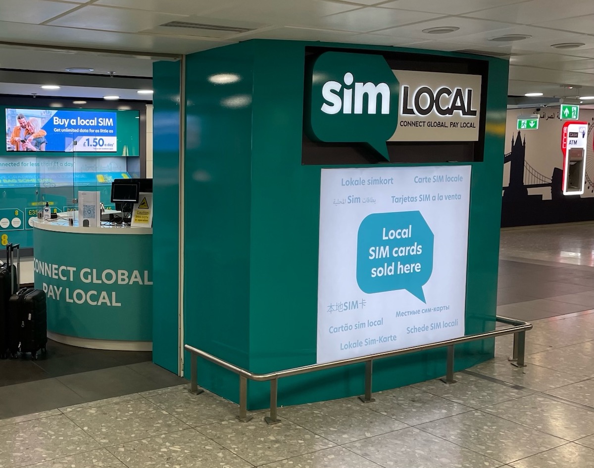 Spending A Winter Month in London: Getting Around by Planes, Trains & Buses - Sim Local Kiosk at Heathrow Airport - Frayed Passport
