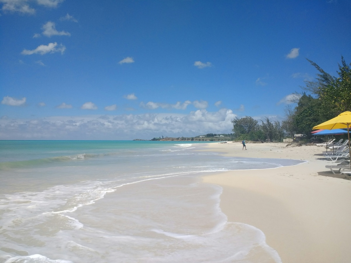 Antigua & Barbuda for Digital Nomads: Comprehensive Guide to Visas, Living, Working & More - Beach - Frayed Passport