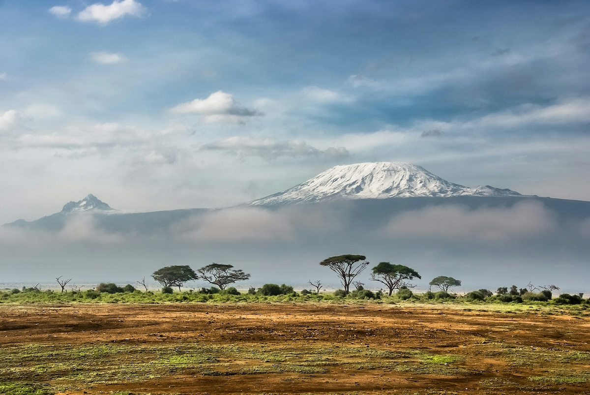 Mount Kilimanjaro, Tanzania - From Glowing Caves to Sky-High Summits: 4 Natural Wonders for Your Next Adventure - Frayed Passport