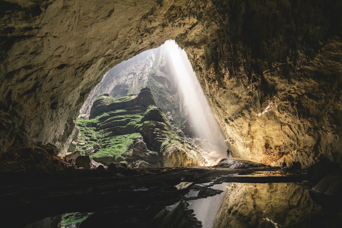 Sunbeams inside the cave - Son Doong Cave, Vietnam - The Cave That's So Large It Has Its Own Weather System (and a Jungle Inside!) - Frayed Passport