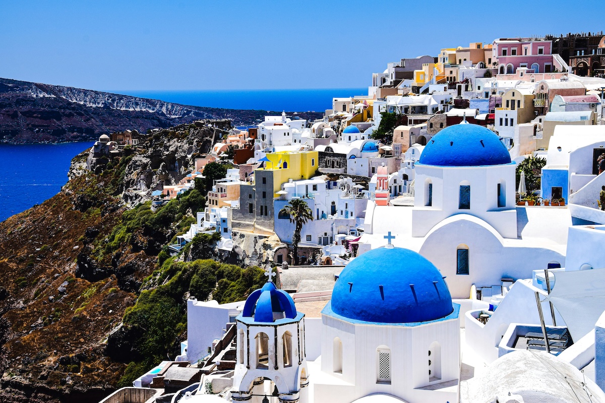 Santorini, Greece - Happy Birthday, Cancer! Here Are 12 Travel Destinations Perfect for Your Style - Frayed Passport