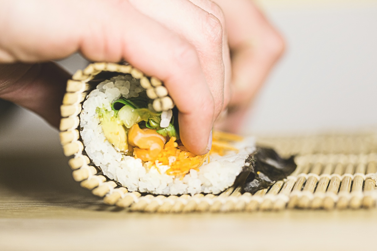 Rolling Sushi - From Pasta Making in Italy to Chef Training in Japan: 9 World Cooking Classes That'll Make You the Most Fascinating Person in the Room - Frayed Passport