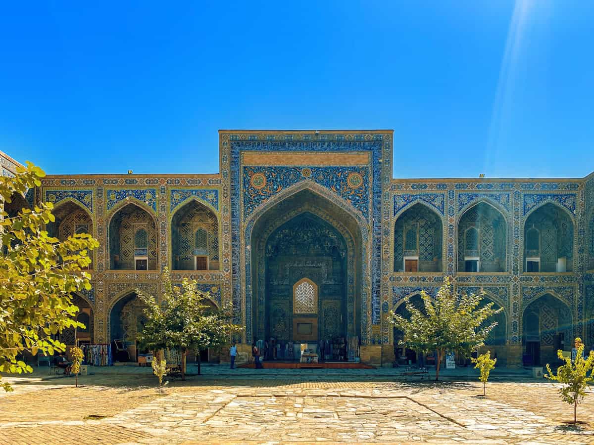 a large building with a blue and yellow design on it
