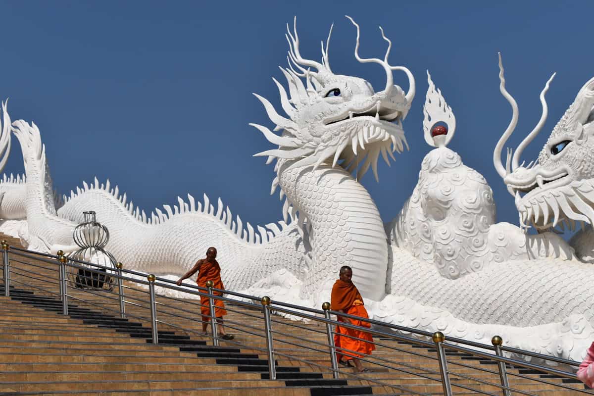 a group of people walking up a flight of stairs