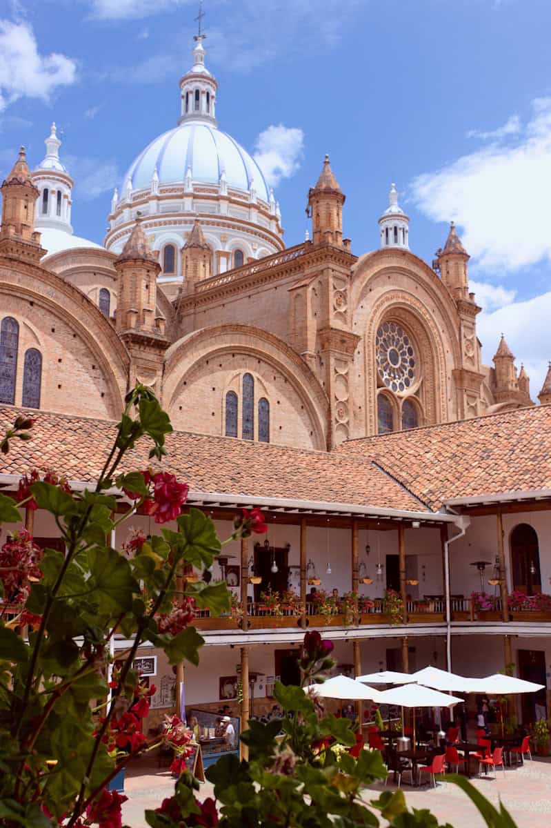 a building with a dome and a clock on it