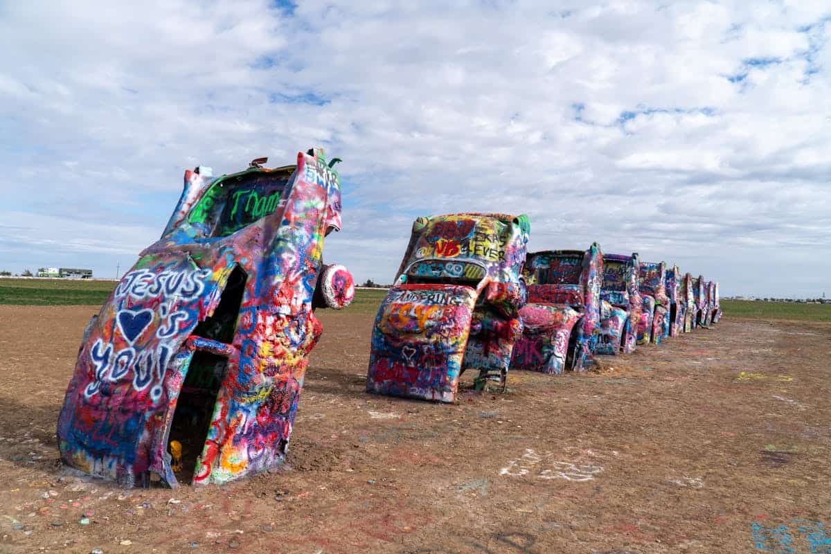 Vividly painted cars at the iconic Cadillac Ranch in Amarillo, Texas.