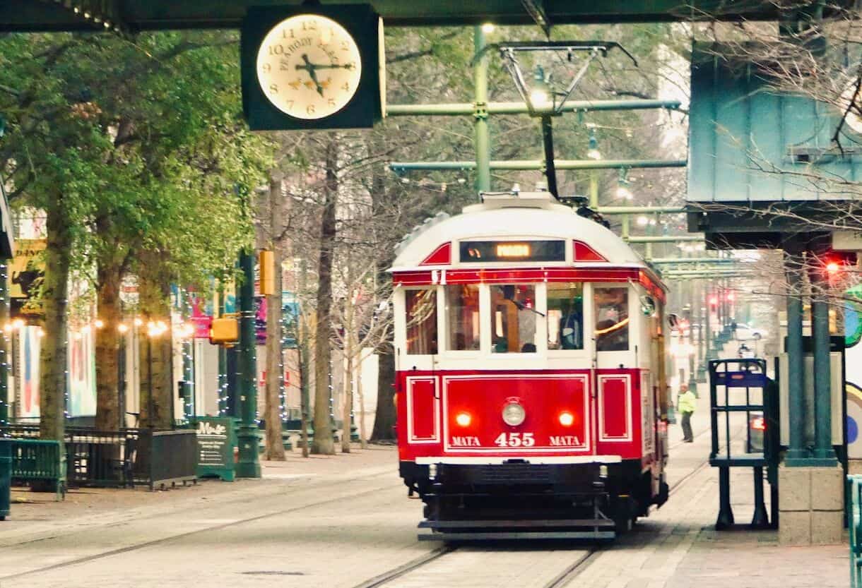 8 U.S. Cities Where $3,000 a Month Goes Further Than You'd Think - Frayed Passport - red and white tram on road during daytime