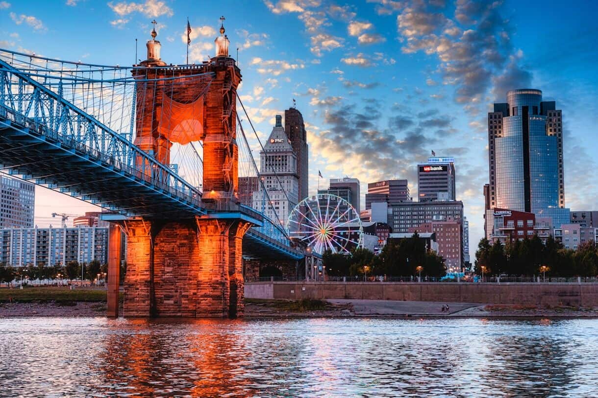 8 U.S. Cities Where $3,000 a Month Goes Further Than You'd Think - Frayed Passport - Cincinnati, OH - low-angle photography of Booklyn Bridge during daytime