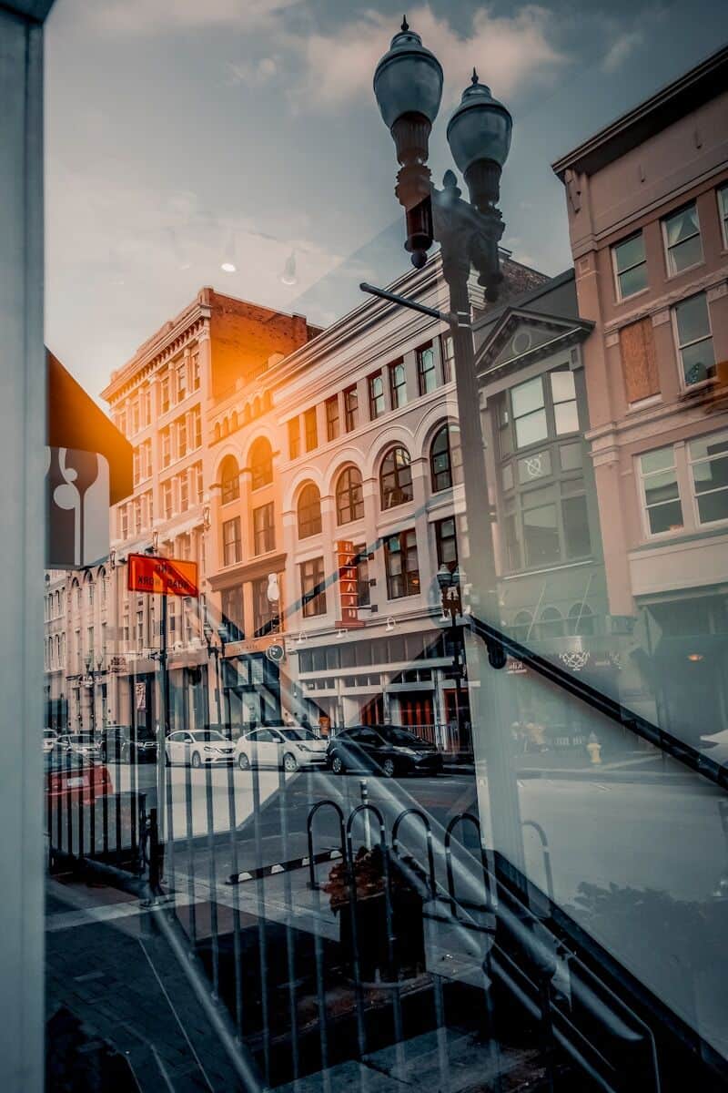 8 U.S. Cities Where $3,000 a Month Goes Further Than You'd Think - Frayed Passport - Knoxville, TN - black metal fence near brown concrete building during daytime