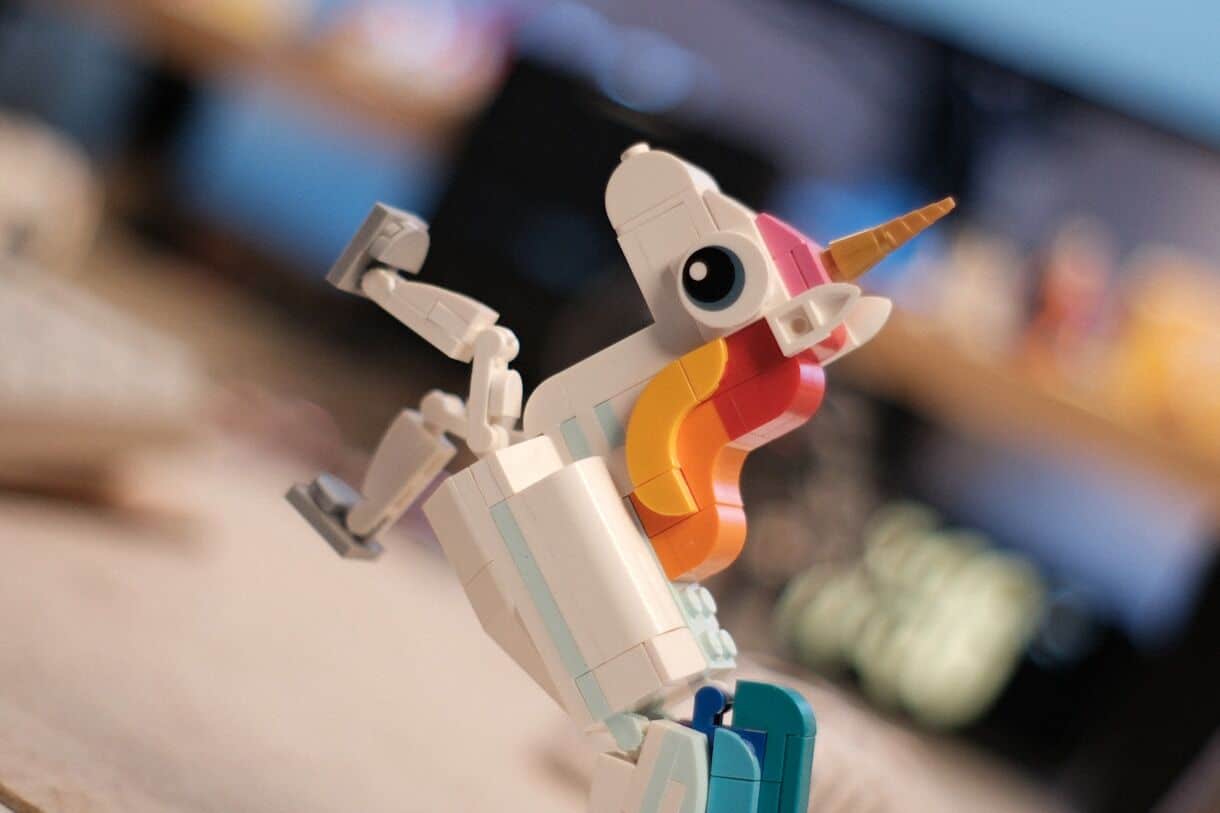 Scotland's national animal is a unicorn - Frayed Passport - A white unicorn made from colorful building blocks.
