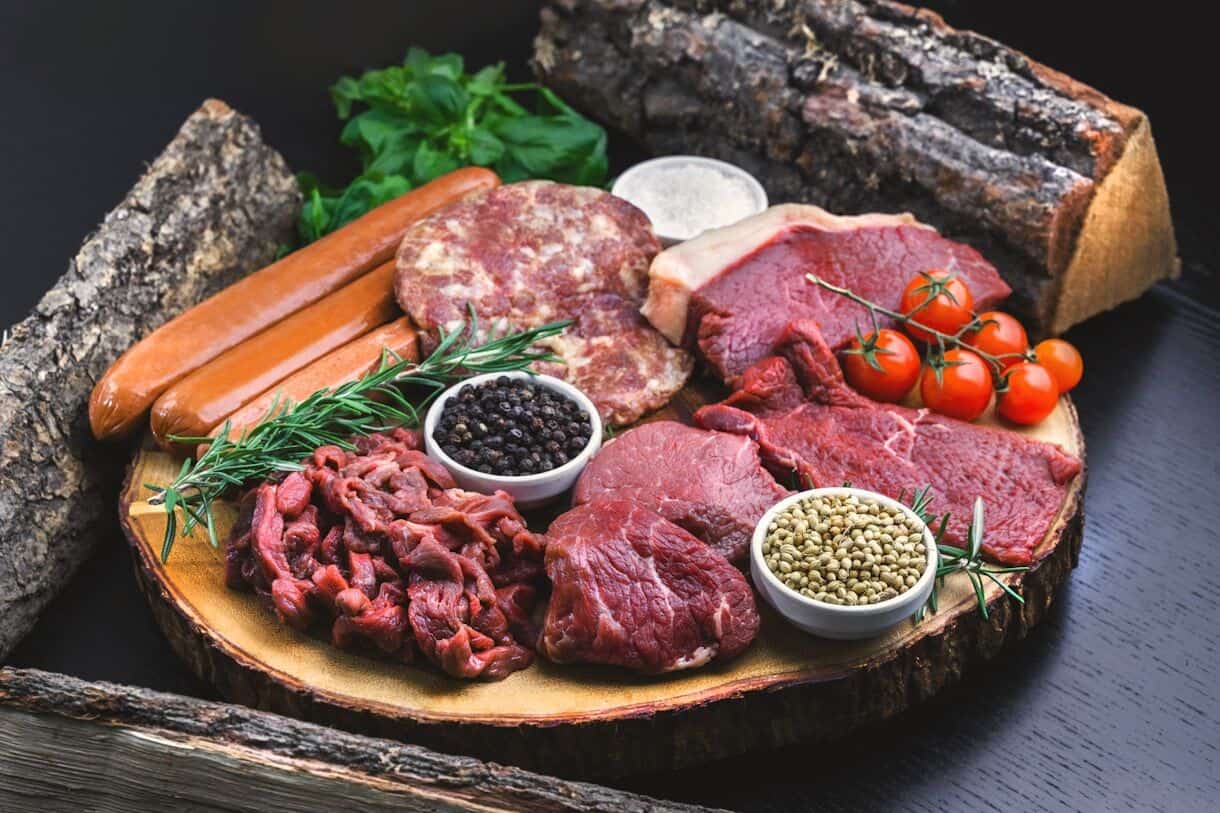 The Victorian scientist who tried to eat every animal - raw meat on white ceramic plate - Frayed Passport